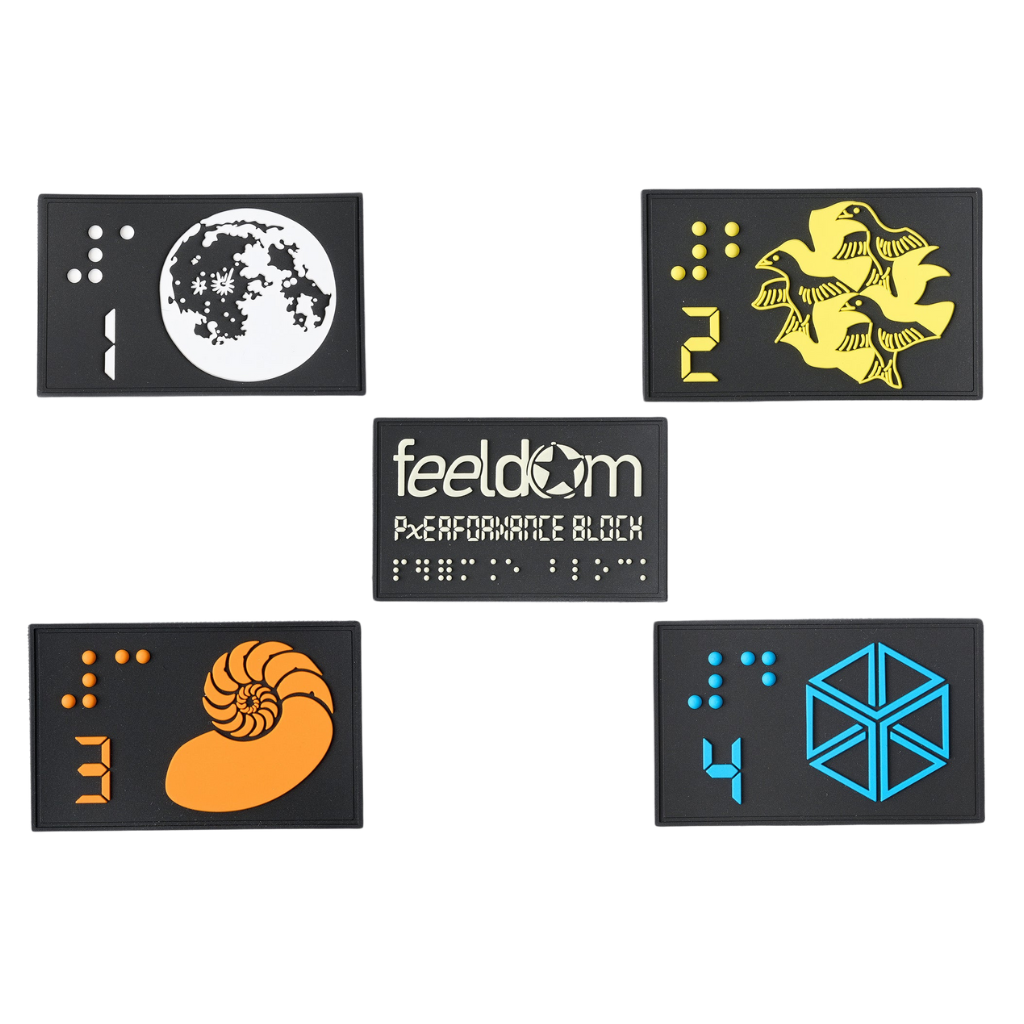 5 tactile Braille design patches (Full Moon, Birds by M.C. Escher, Nautilus revealing the Fibonacci Sequence, 3-D Cube optical illusion, Feeldom x Performance Block patch which glows in the dark).