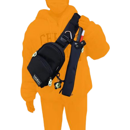 A navy blue cane pouch with a cane inside, attached to Feeldom JAYU Freeform bag using a carabiner and a stabilizer clip. (JAYU Freeform bag is available separately)